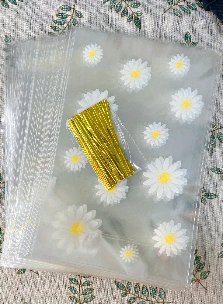 50-Piece Daisy Print Clear Plastic Gift Bags with Drawstring Closure for Wedding Favors, Birthday Party Supplies, Candy Bags, Cookie Packaging, Cake Pop Sleeves (15x23cm) - Image 1