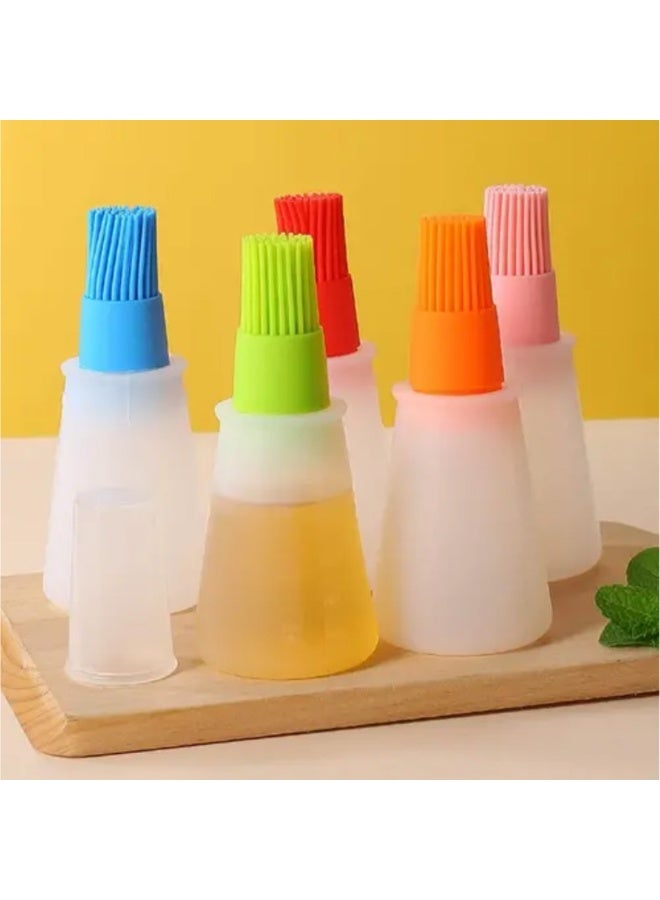 A multi-purpose oil and ghee brush with a silicone bottle for even liquid distribution; available in multiple colors – a must-have kitchen accessory. - Image 1