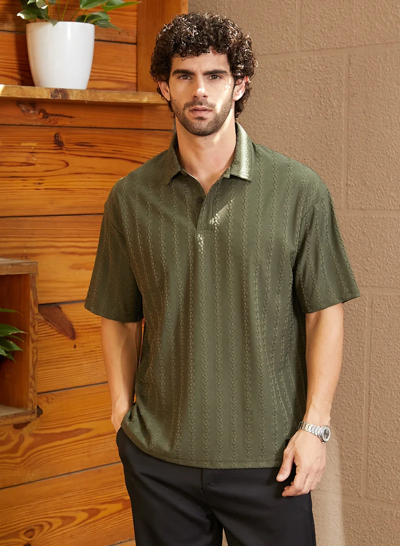 Campus Sutra Men's Army Green Spiralknot-Tactile Oversized Polo T-Shirt