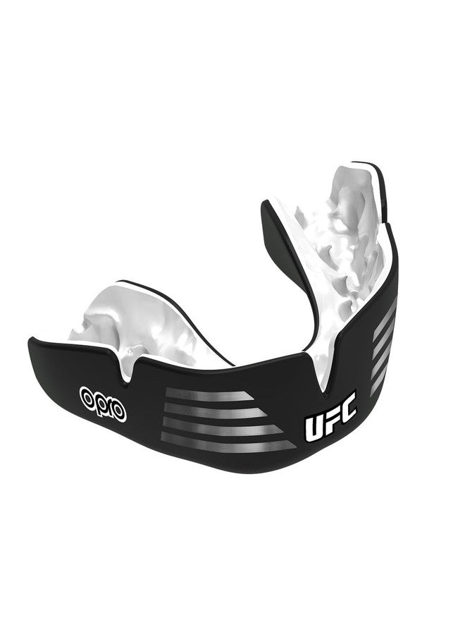 أوبرو واقي الفم الجديد من OPRO، مصمم خصيصًا ليناسب احتياجاتك في UFC، واقي فم لأطباء الأسنان، تقنية تركيب ثورية لتوفير أقصى درجات الراحة والحماية والملاءمة، واقي للثة مناسب للملاكمة وفنون القتال المختلطة والرياضات القتالية (أسود UFC، للبالغين) - Image 1