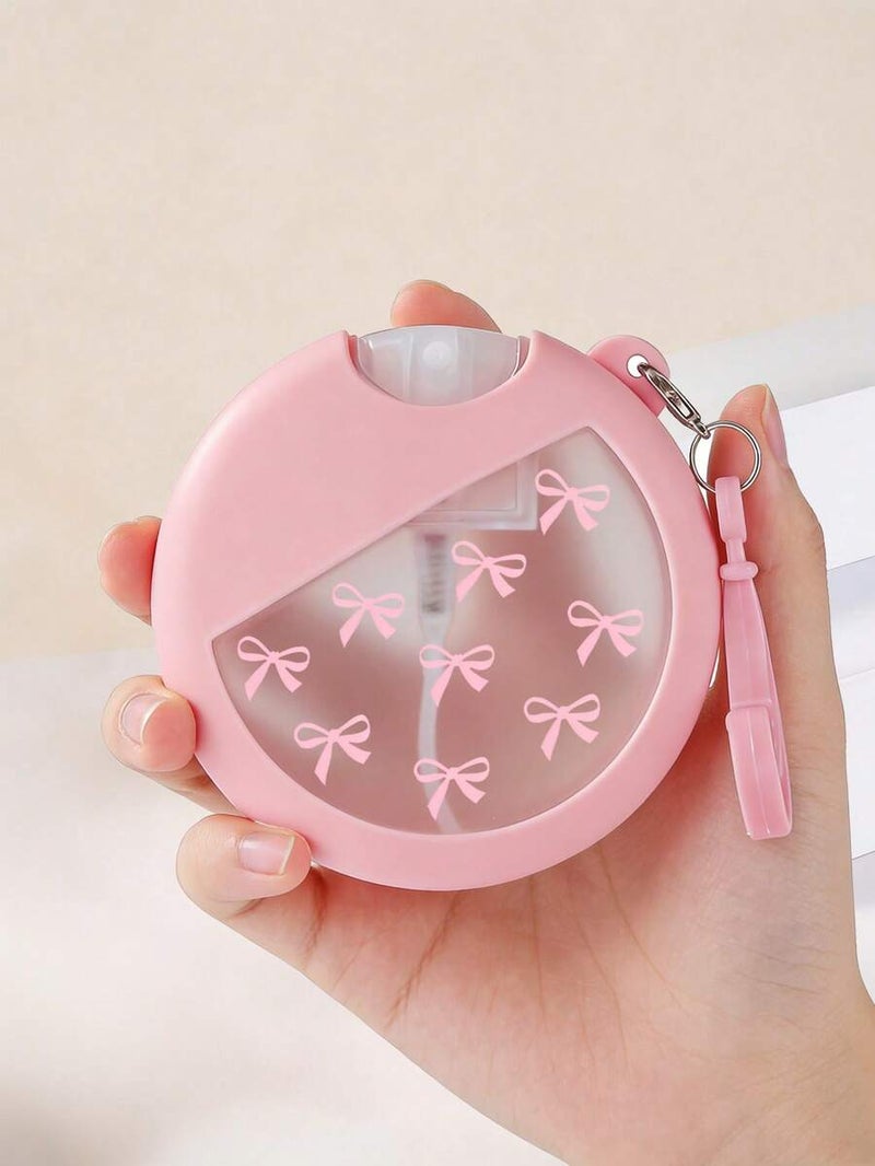 Pink Bow Silicone Spray Bottle with Bow Print, Ideal for Home & Travel - Image 1