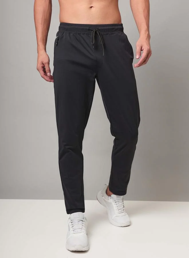 تكنوسبورت Technosport Men Solid 4-Way Stretch Track Pants