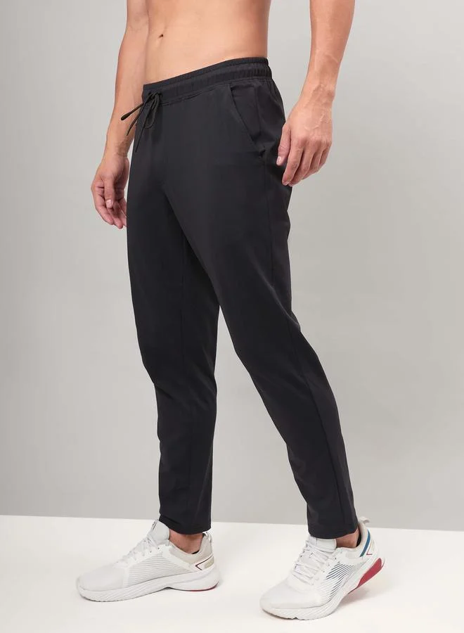تكنوسبورت Technosport Men Solid 4-Way Stretch Track Pants