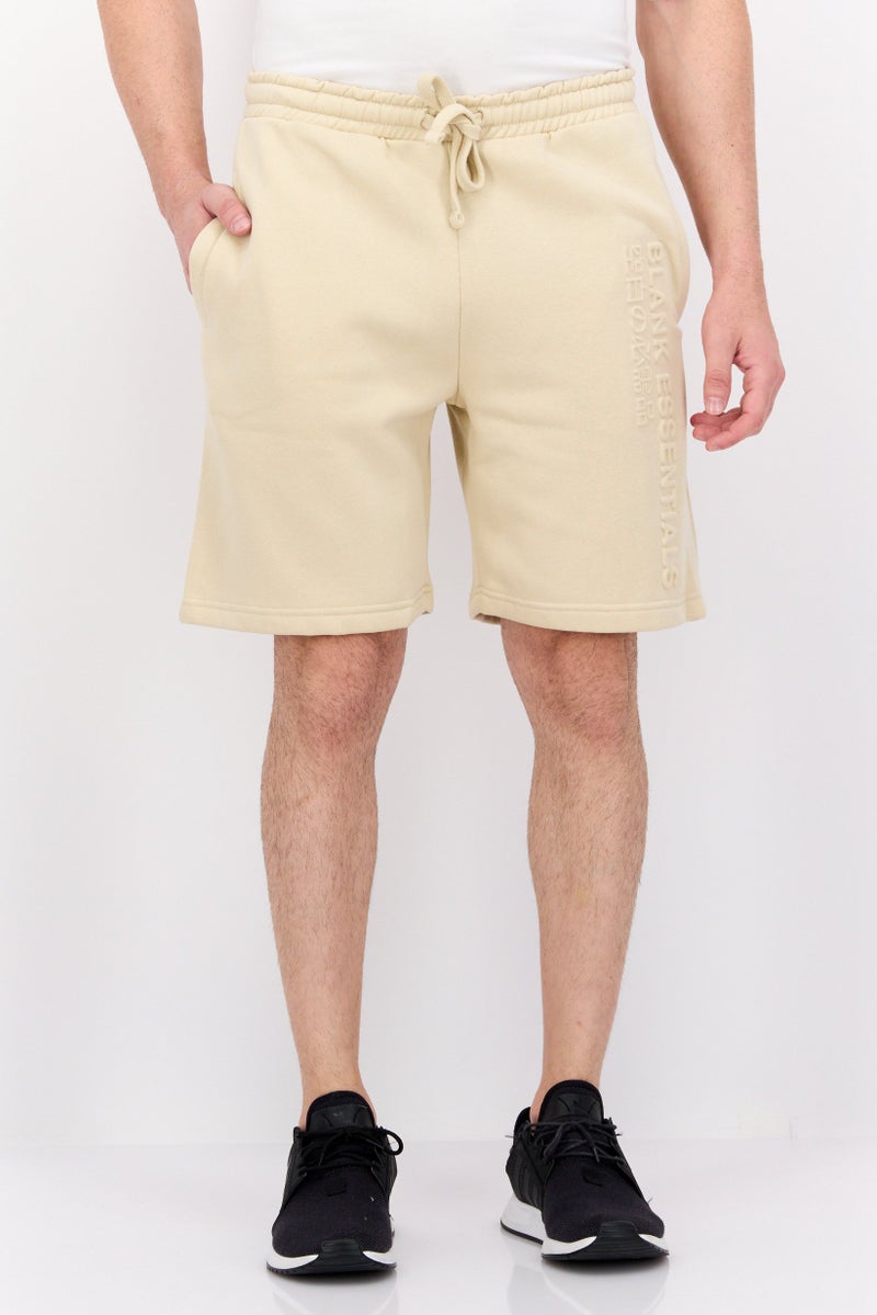 Blank Essentials Men Drawstring Embossed Brand Shorts, Beige - Image 1