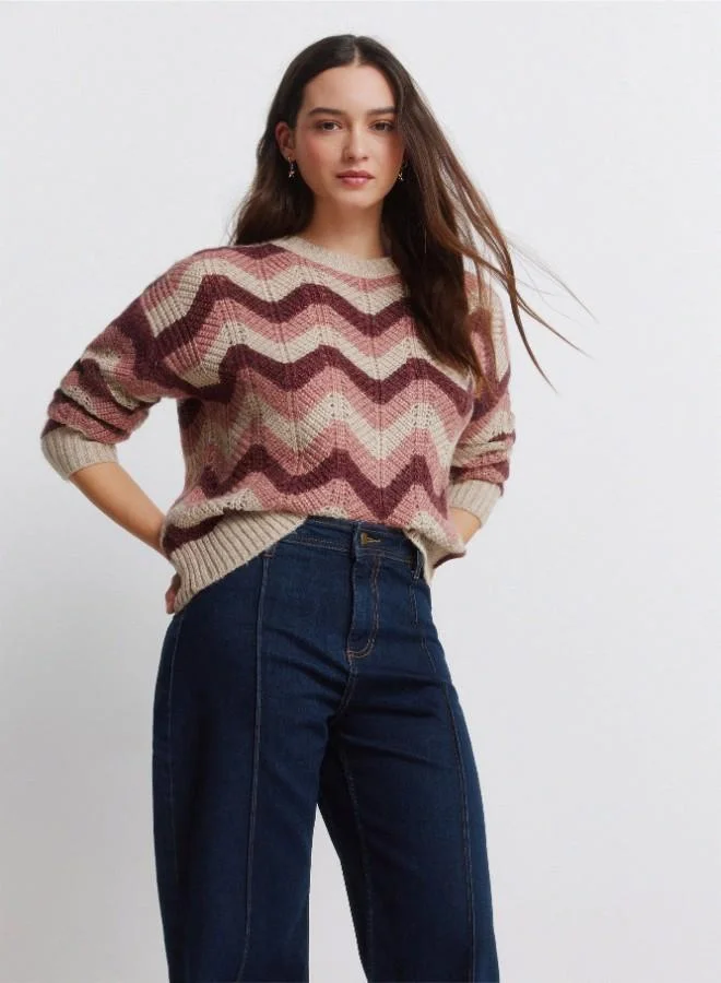 Springfield High-waisted jeans with back patch pockets, button and zip fastening fastening , front seams, and a wide, straight leg. These jeans feature a washing process using new technologies, reducing water, chemical, and energy consumption.