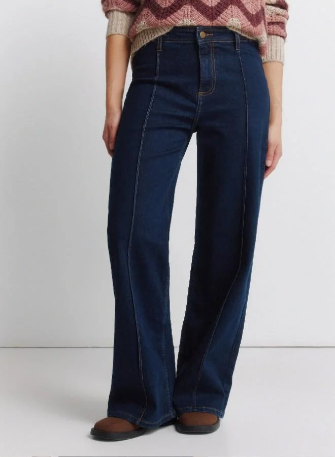 Springfield  High-waisted jeans with back patch pockets, button and zip fastening fastening , front seams, and a wide, straight leg. These jeans feature a washing process using new technologies, reducing water, chemical, and energy consumption. for Women | Best Price UAE