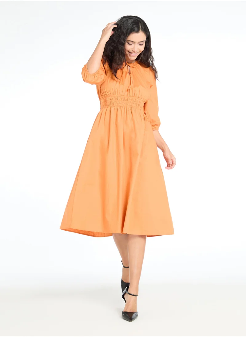 The Label Life Caramel Smocked Midi Dress