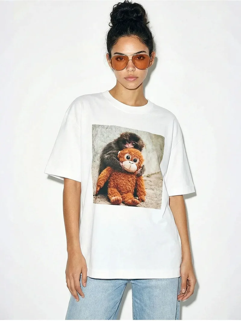 بيانكو لوتشي LUCCI Oversized Printed Crew Neck T-Shirt with Accessory Detail