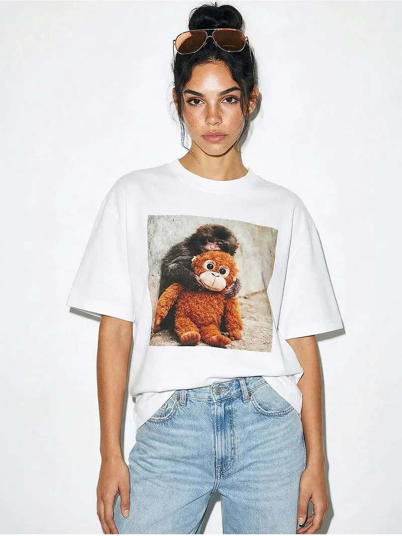 بيانكو لوتشي LUCCI Oversized Printed Crew Neck T-Shirt with Accessory Detail