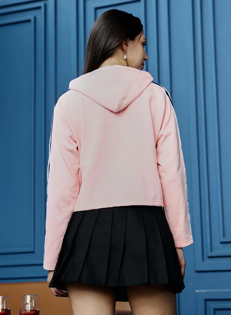 PINACOLADA  Women's Baby Pink Cropped Hoodie With Contrast Striped Sleeve | نساء | طوق بغطاء رأس | أكمام طويلة | نقش سادة | كاجوال ويومي | سويتشيرت for Women | Best Price UAE