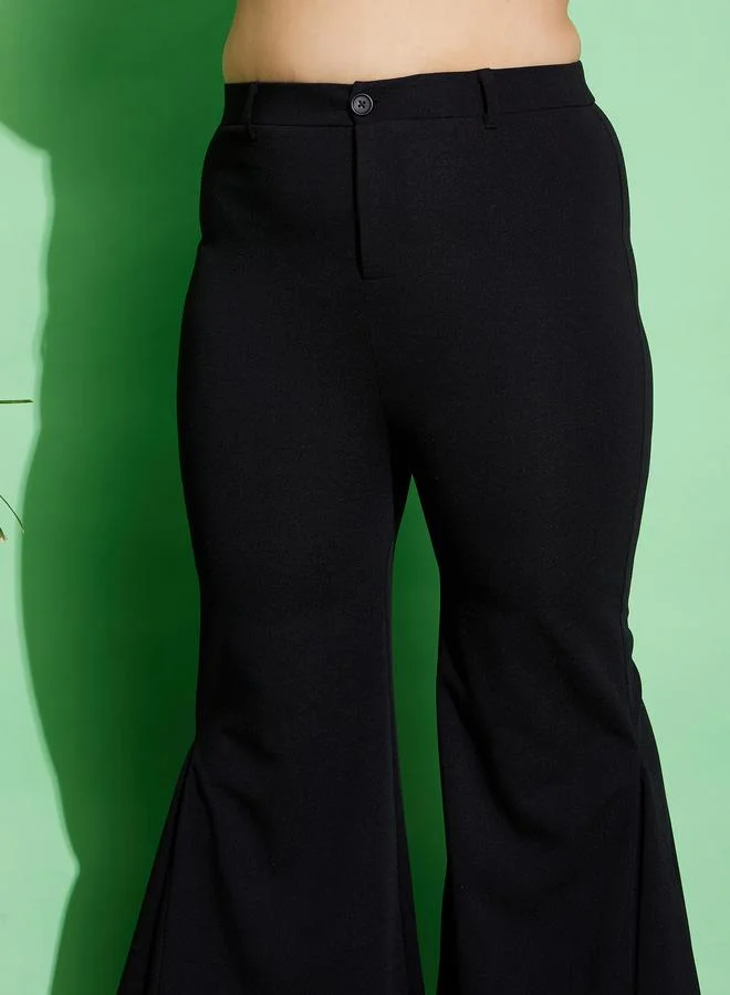 SASSAFRAS Plus Mid Rise Pleated Flared Pants by Styli