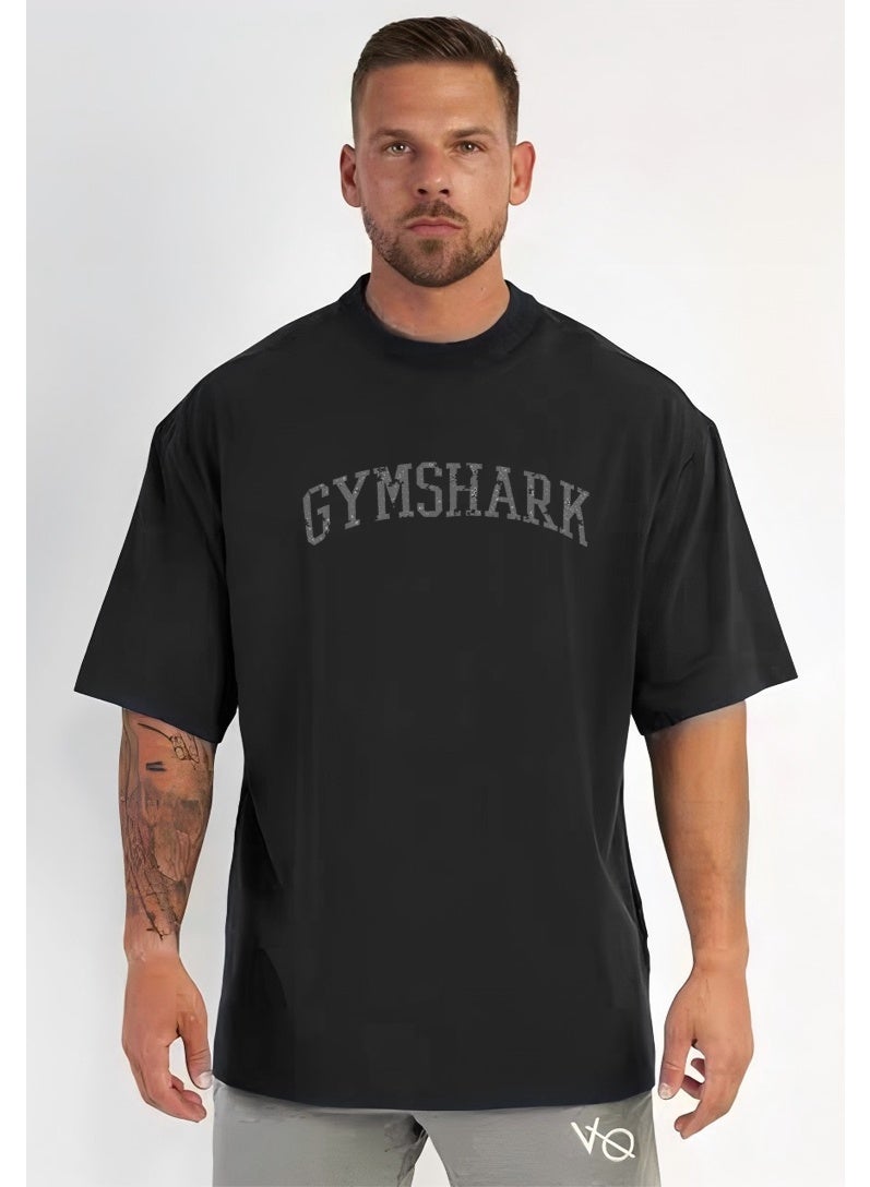 جيمشارك Gymshark أسود ضخم الأكمام القصيرة تي شيرت - شعار مضطرب طباعة، مريحة تناسب، نسيج ناعم تنفس، الرياضة للجنسين والقمة عارضة اليومية - Image 1