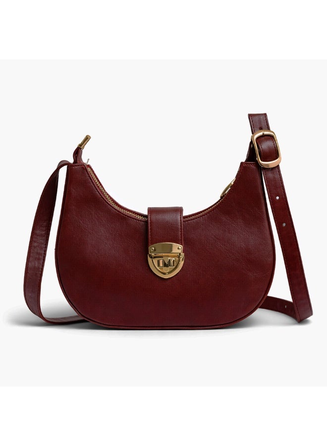 A stylish women's shoulder bag with a design that combines elegance and practicality, featuring a distinctive gold clasp and an adjustable strap. - Image 2