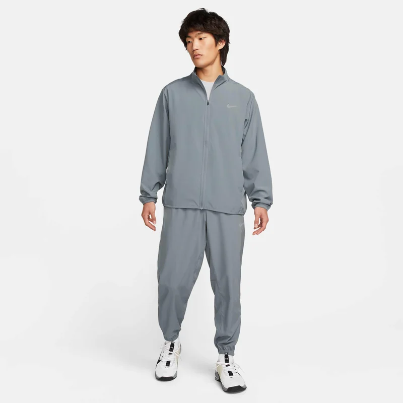 Nike grey Men's Dri-FIT Tapered Pants for Men | Best Price UAE