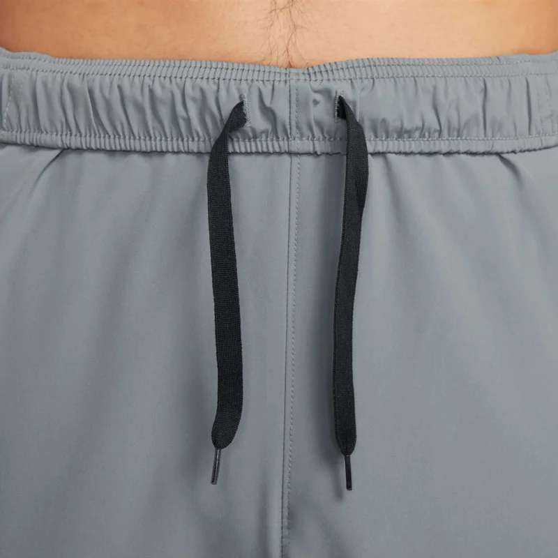Nike grey Men's Dri-FIT Tapered Pants for Men | Best Price UAE