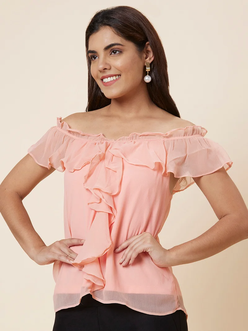 جلو باص بلوزة نسائية سادة من البوليستر بلون الخوخي