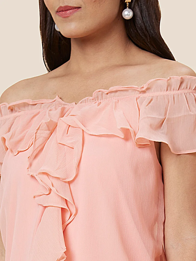 جلو باص بلوزة نسائية سادة من البوليستر بلون الخوخي