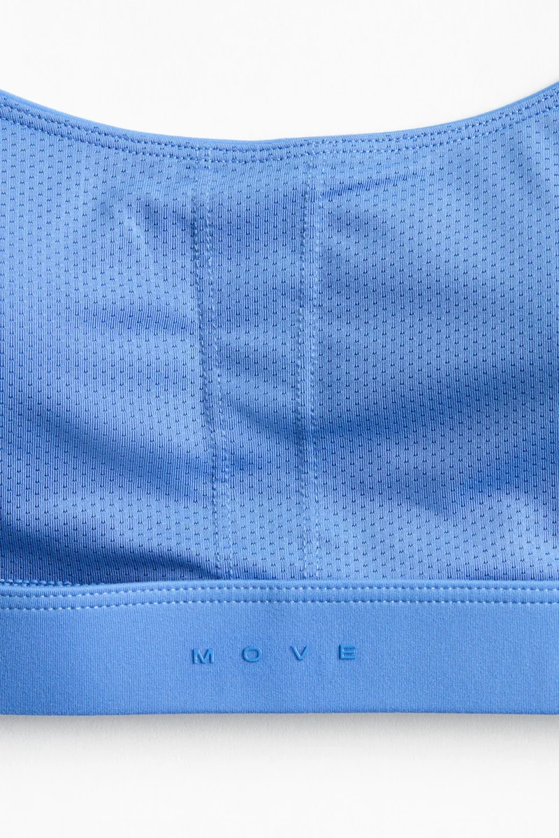 H&M  Light Support Halterneck sports bra with SoftMove™ for Women | Best Price UAE