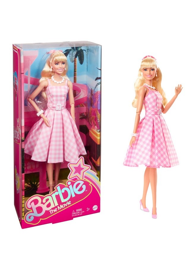 Barbie دمية الفيلم ترتدي فستانًا مخططًا باللونين الوردي والأبيض مع قلادة سلسلة الزهور  - Image 1