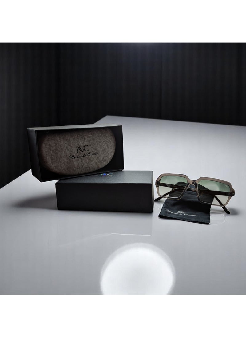 Authentic Armando Cavelli sunglasses, crafted from carefully selected premium acetate for a luxurious look and longevity with extensive use. This model combines modernity and classic style, with a raw grey acetate front and gunmetal -plated metal temples to complete your luxury look. Comes with premium polymer lenses offer UV400 protection in a gradient olive green