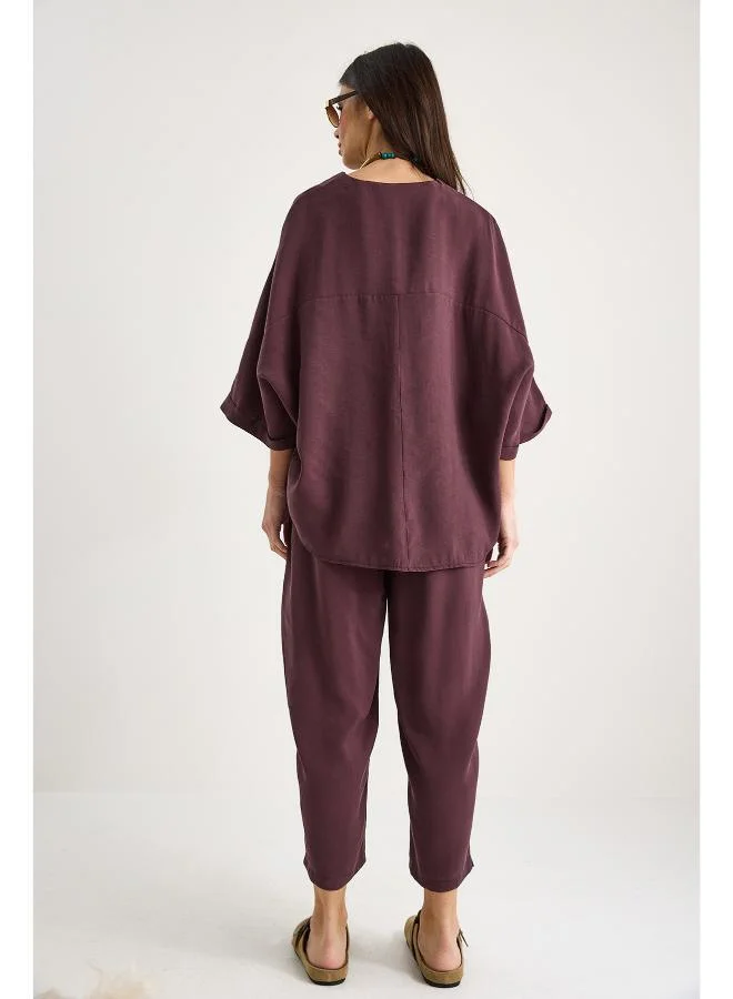 جينجر طقم بلوزة وبنطلون بقصة مريحة