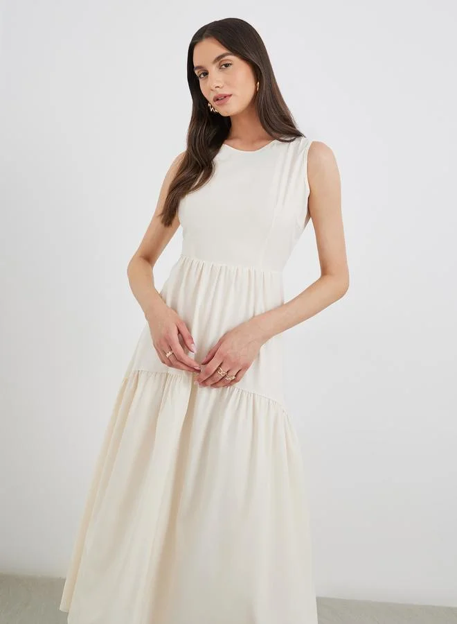 Take Two Take Two Beige Solid Sleeveless Tiered Midi Dress