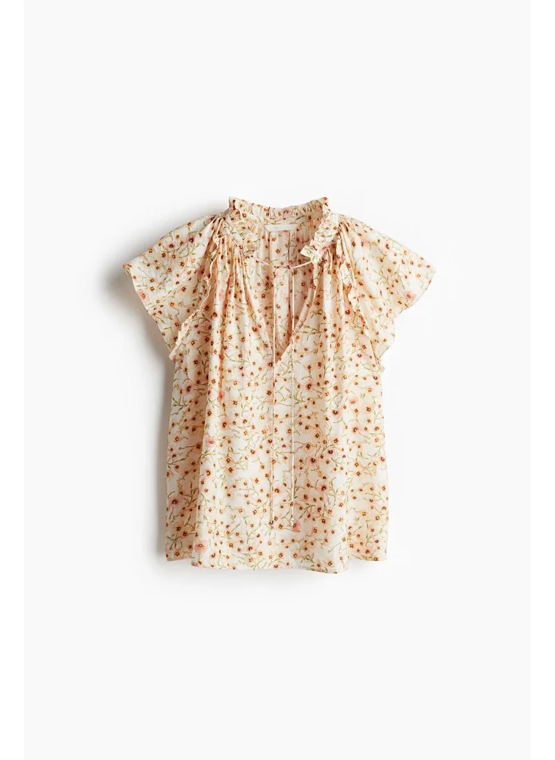 H&M Butterfly-sleeved blouse
