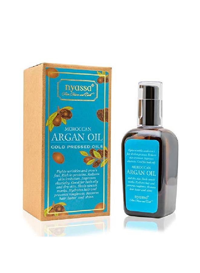 Nyassa Cold pressed Moroccan Argan Oil 100 ml. Pure Argan oil from Morocco with additional dose of Vitamin E. Good for both oily and dry skin.For healthy shiny frizz free hair; Smooth youthful skin. - Image 2