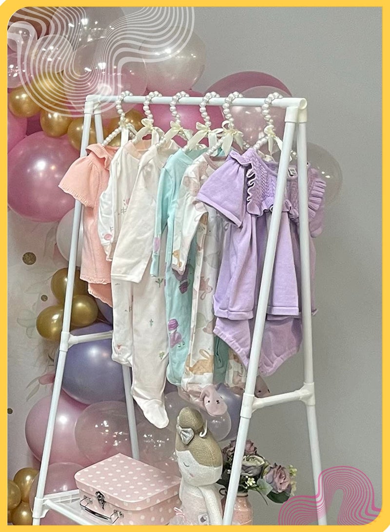 شي آند ليتل ٥ قطع شماعات لؤلؤية صغيرة للأطفال مع فيونكة، شماعات مضادة للانزلاق للفساتين وملابس الأطفال، تشطيب لؤلؤي ABS ناعم، مثالية للمنزل أو عرض البوتيك (أبيض) - Image 2