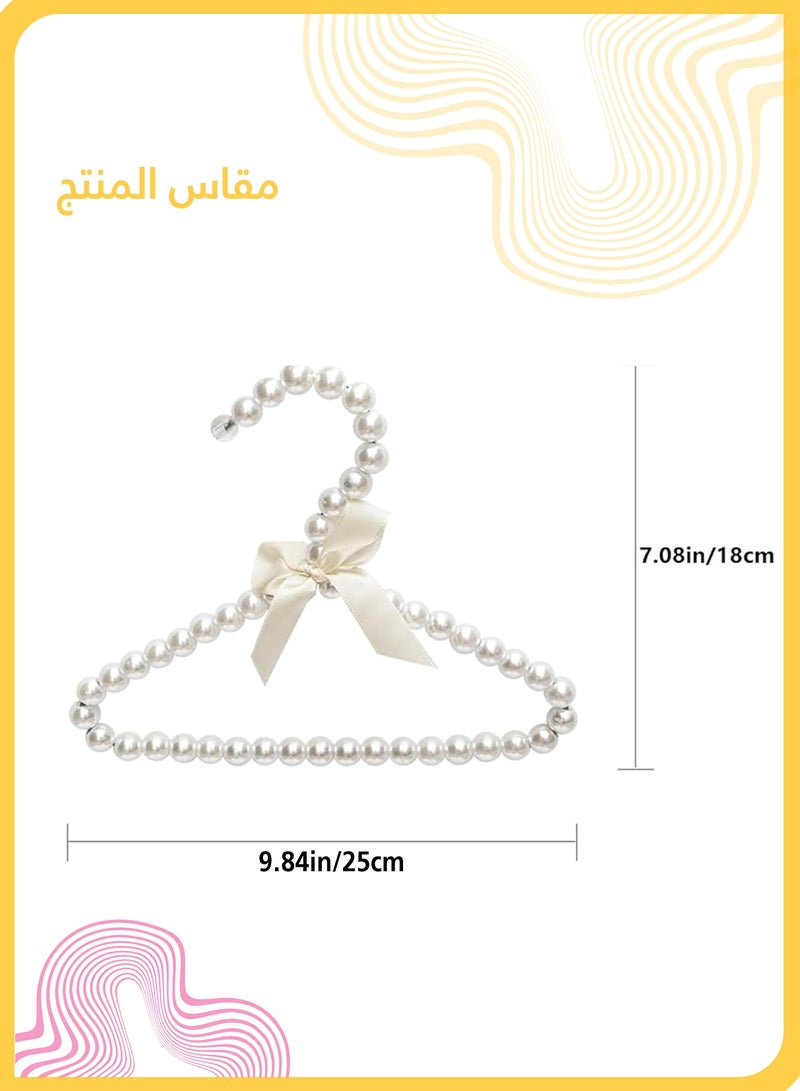 شي آند ليتل ٥ قطع شماعات لؤلؤية صغيرة للأطفال مع فيونكة، شماعات مضادة للانزلاق للفساتين وملابس الأطفال، تشطيب لؤلؤي ABS ناعم، مثالية للمنزل أو عرض البوتيك (أبيض) - Image 5