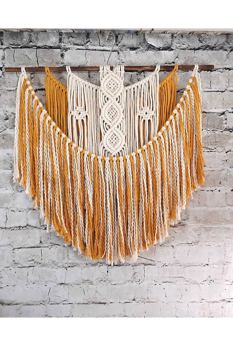 Antikiano An elegant handmade macrame piece, carefully crafted from natural cotton threads. It combines simplicity and beauty in a modern bohemian design. Featuring balanced knots and fine details, it adds a unique artistic touch to any space. Perfect for decorating walls in bedrooms, living rooms, or hallways, and also makes a special gift for lovers of handmade decor and boho style.