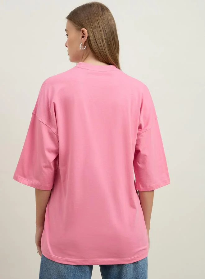 Styli Styli Women Pink Slogan Embroidered Dropped Shoulder Oversized T-Shirt