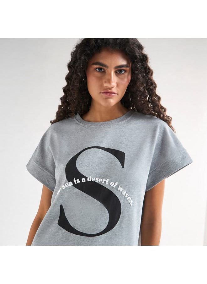 FAV - Printed T-shirt Dress with Extended Short Sleeves and Slit Detail - Image 1