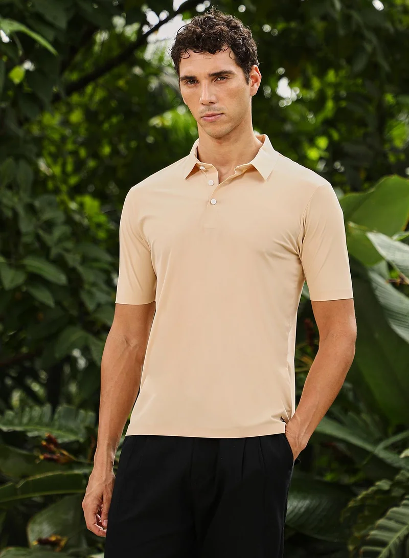 Campus Sutra Men Seamless Solid Polo T-Shirt | Point Collar, Short Regular Sleeves | Half-Button , Straight Hem | Solid Knitted Fabric For Casual & Daily Wear | Cream White