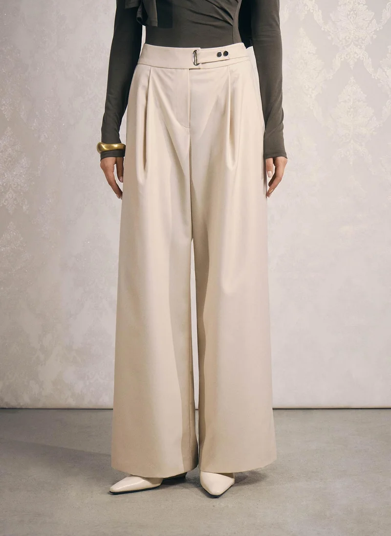 Lichi Loose-fit trousers with asymmetrical fastening