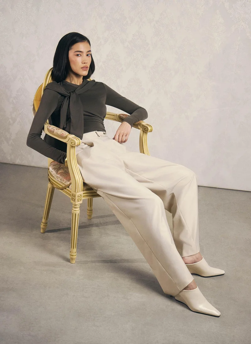 Lichi  Loose-fit trousers with asymmetrical fastening for Women | Best Price UAE