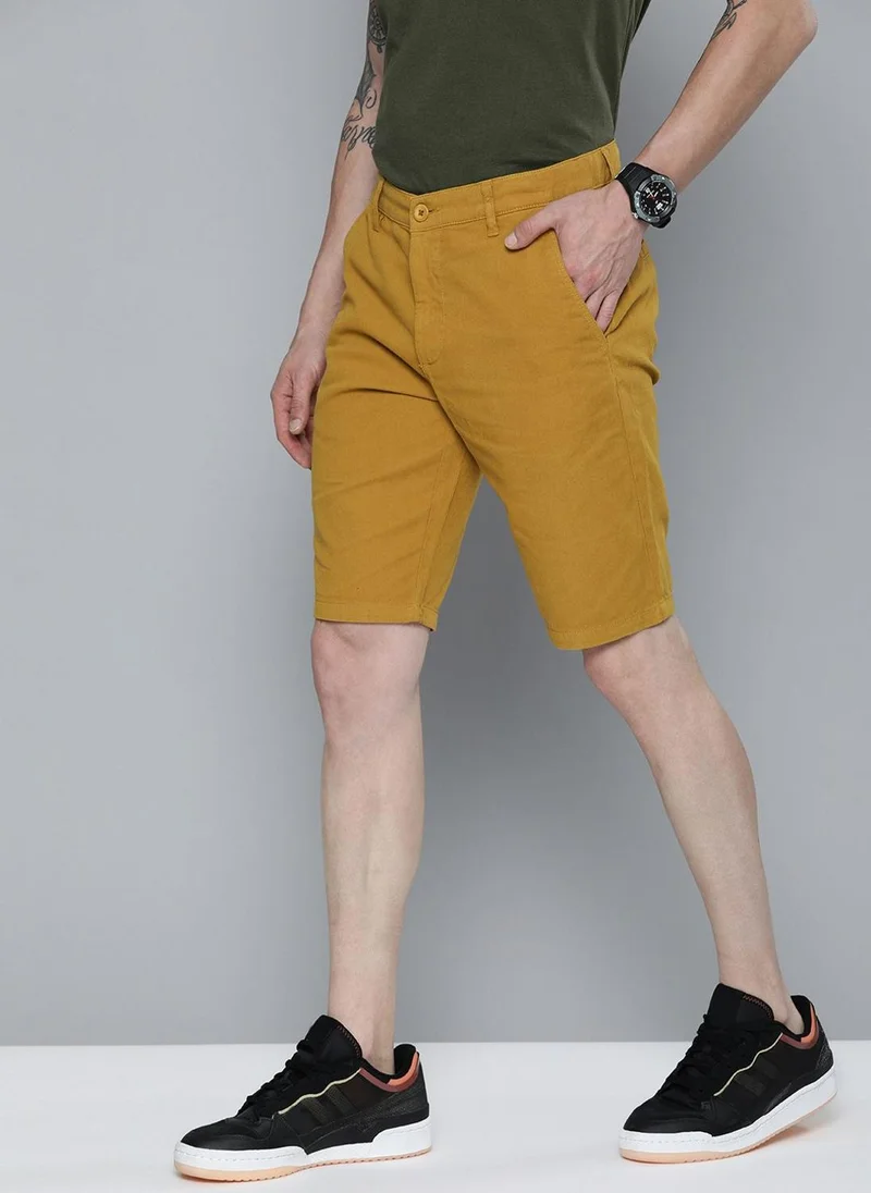 ذا انديان كراج كو Men Slim Fit Solid Mid-Rise Chino Shorts
