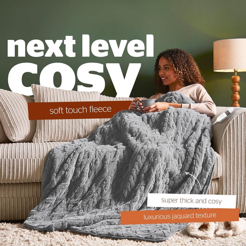 سايلنت نايت بطانية كهربائية دافئة من نوع سايلنتナイト لوكس سوبر كوزي (Silentnight Luxury Super Cosy)، مصنوعة من صوف كثيف وناعم، مزودة بتصميم جاكارد، مناسبة للأرائك والأسرّة المنزلقة. تتميز بتسعة مستويات حرارة مختلفة، سرعة تسخين عالية، وإيقاف آمن للجهاز. يمكن غسلها في الغسالة الأتوماتيكية. - Image 3