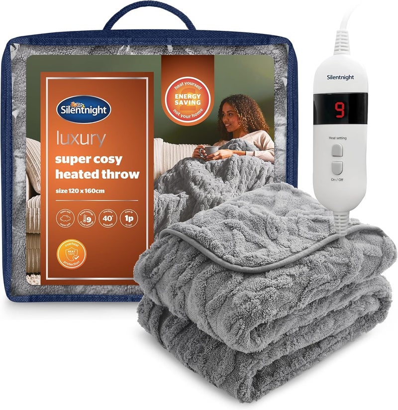 سايلنت نايت بطانية كهربائية دافئة من نوع سايلنتナイト لوكس سوبر كوزي (Silentnight Luxury Super Cosy)، مصنوعة من صوف كثيف وناعم، مزودة بتصميم جاكارد، مناسبة للأرائك والأسرّة المنزلقة. تتميز بتسعة مستويات حرارة مختلفة، سرعة تسخين عالية، وإيقاف آمن للجهاز. يمكن غسلها في الغسالة الأتوماتيكية. - Image 1