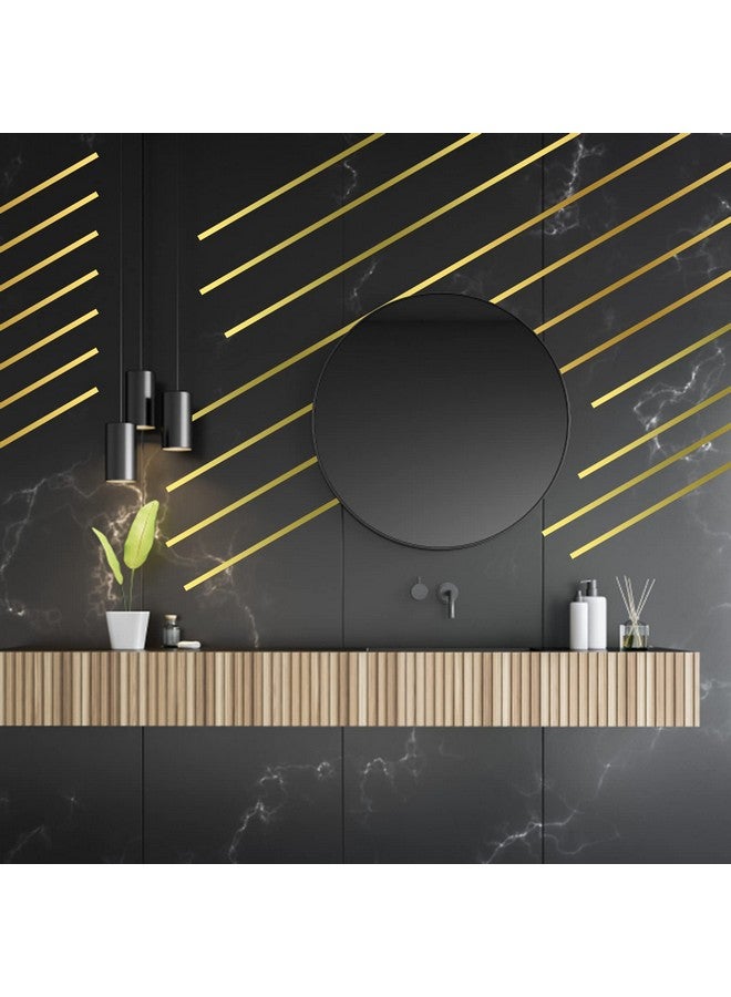 جريفوسيا 4 لفات شريط مرآة معدني، 65 قدمًا شريط فني جرافيكي ذاتي اللصق من البوليستر المعدني لتزيين الحائط وخزانة الملابس والحمام وتغليف الهدايا (ذهبي) - Image 2