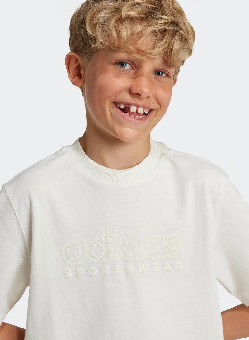 adidas تيشيرت تدريب أبيض للأولاد من جيه سيزون جرافيكس مقاس - سنوات