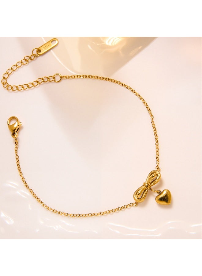 XIXI Gold Stainless Steel Minimalist Bowknot Dangle Heart Charm Anklet - Image 1