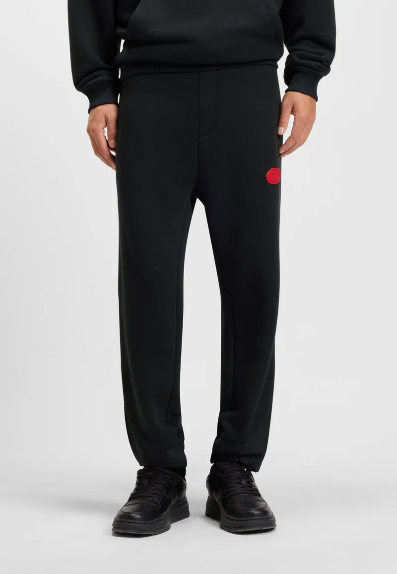 HUGO Cotton-blend tracksuit bottoms with waxed-stamp logo