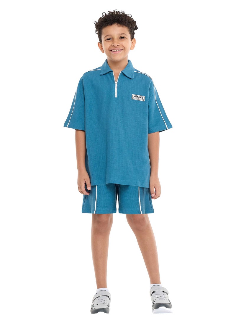فكتور اند جين طقم جاكار للأولاد من فيكتور وجين – طقم مكون من قطعتين باللون الأزرق المخضر مع جيوب، وتي شيرت بولو بنصف سحاب وشورت - Image 5