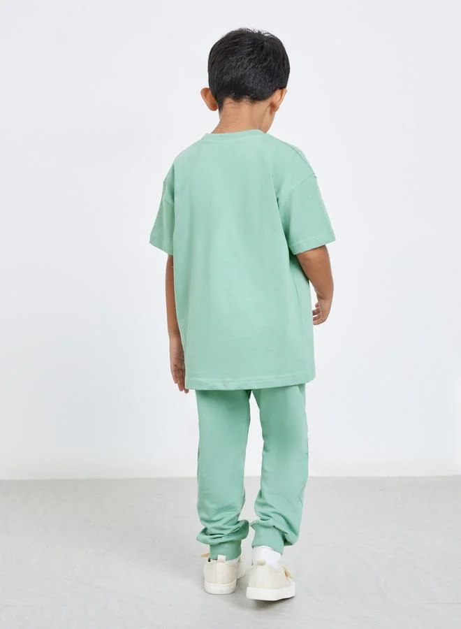 Styli Styli Boys Green Slogan Oversized T-Shirt and Joggers Set