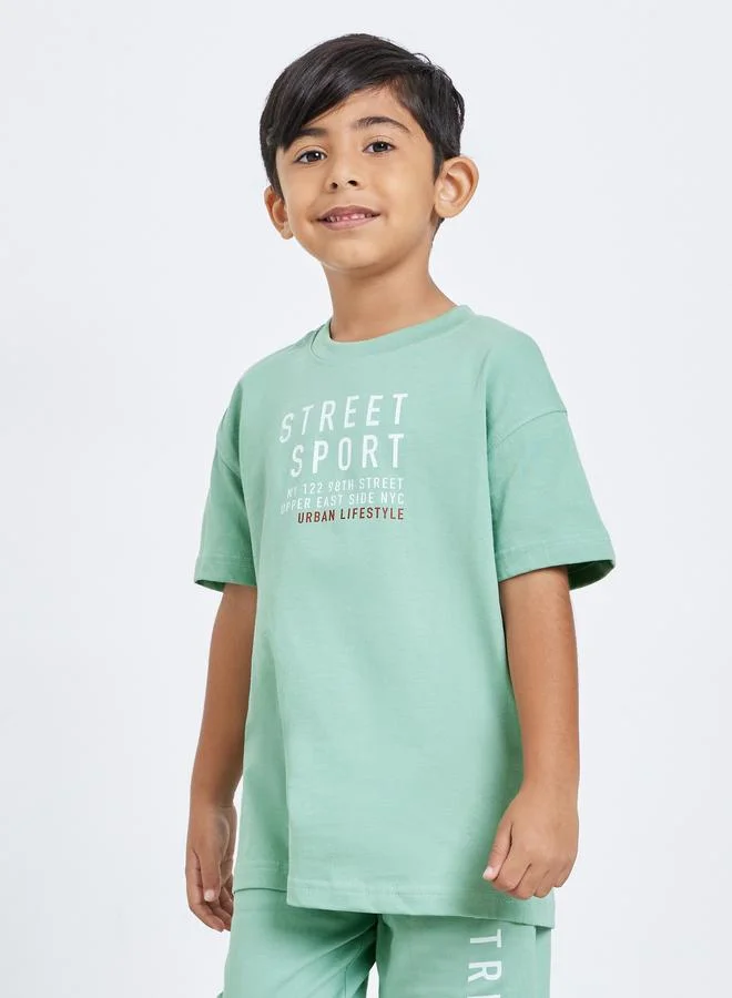 ستايلي Styli Boys Green Slogan Oversized T-Shirt and Joggers Set