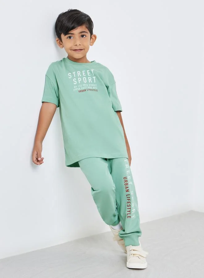 Styli Styli Boys Green Slogan Oversized T-Shirt and Joggers Set
