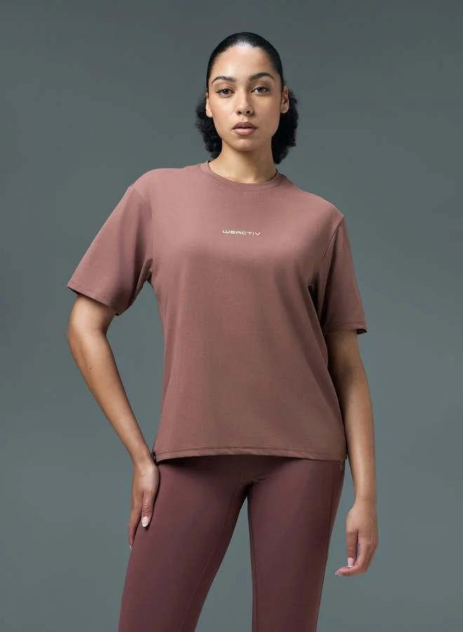 تكنوسبورت تيشيرت رياضي بياقة دائرية وقصة بوكسي للنساء