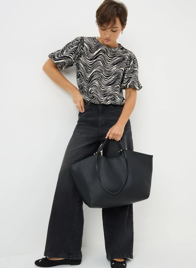 ماتلان بلوزة بتصميم مونو سويزل مطبوع