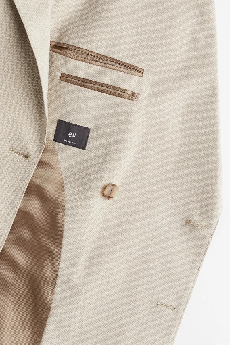 اتش اند ام جاكيت بصدر مزدوج وقصّة عادية